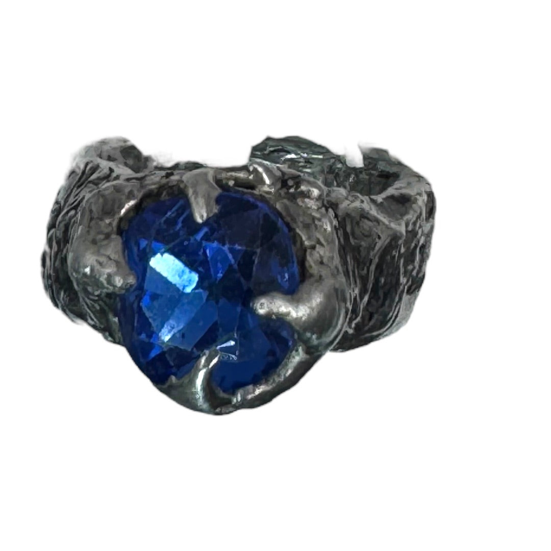 Brutalist Style Silver Blend Metalwork Ring With 10mm Cushion Blue Crystal Stone