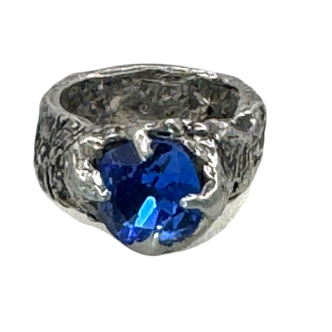 Brutalist Style Silver Blend Metalwork Ring With 10mm Cushion Blue Crystal Stone