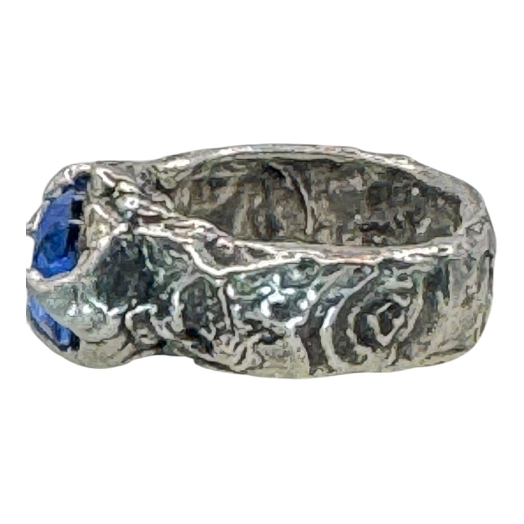 Brutalist Style Silver Blend Metalwork Ring With 10mm Cushion Blue Crystal Stone