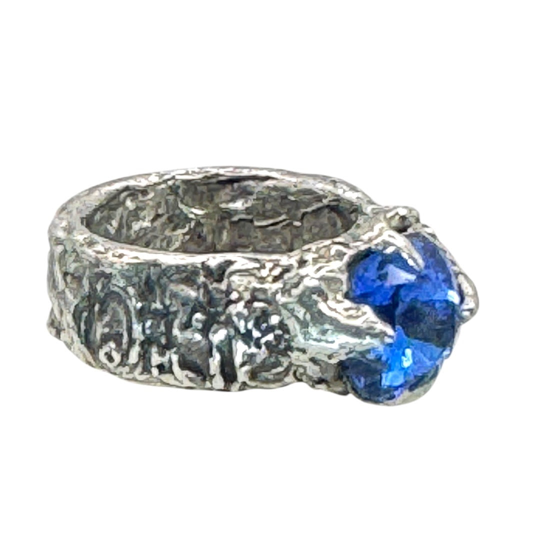 Brutalist Style Silver Blend Metalwork Ring With 10mm Cushion Blue Crystal Stone