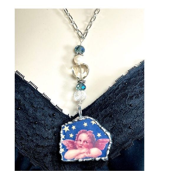 Cherub Broken China Pendant Caged in Silver Blend Bezel & Crystal Beads