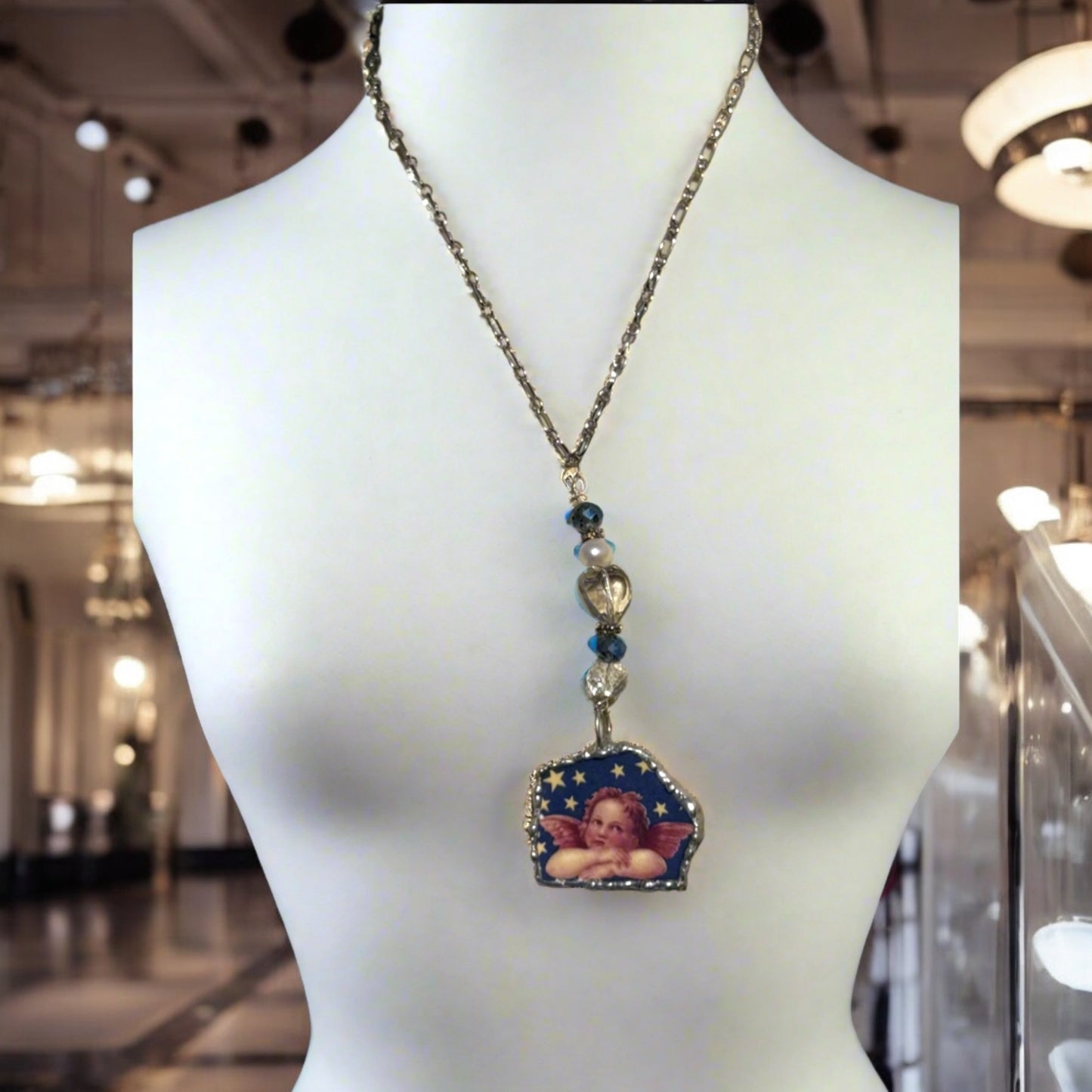 Cherub Broken China Pendant Caged in Silver Blend Bezel & Crystal Beads