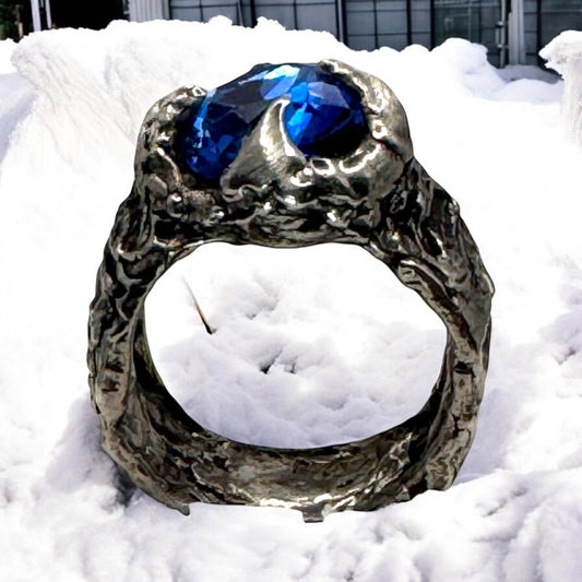 Brutalist Style Silver Blend Metalwork Ring With 10mm Cushion Blue Crystal Stone