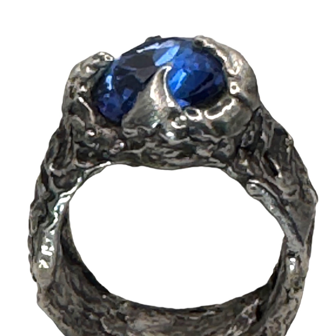 Brutalist Style Silver Blend Metalwork Ring With 10mm Cushion Blue Crystal Stone
