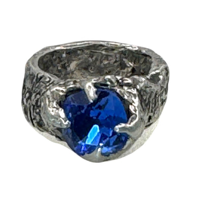 Brutalist Style Silver Blend Metalwork Ring With 10mm Cushion Blue Crystal Stone